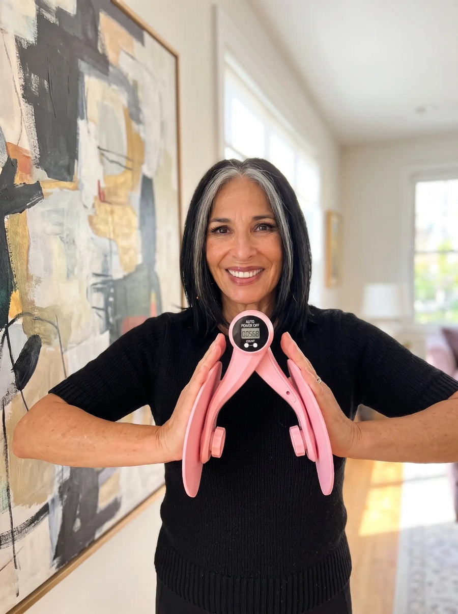 A confident smiling woman pressing the Zenya trainer